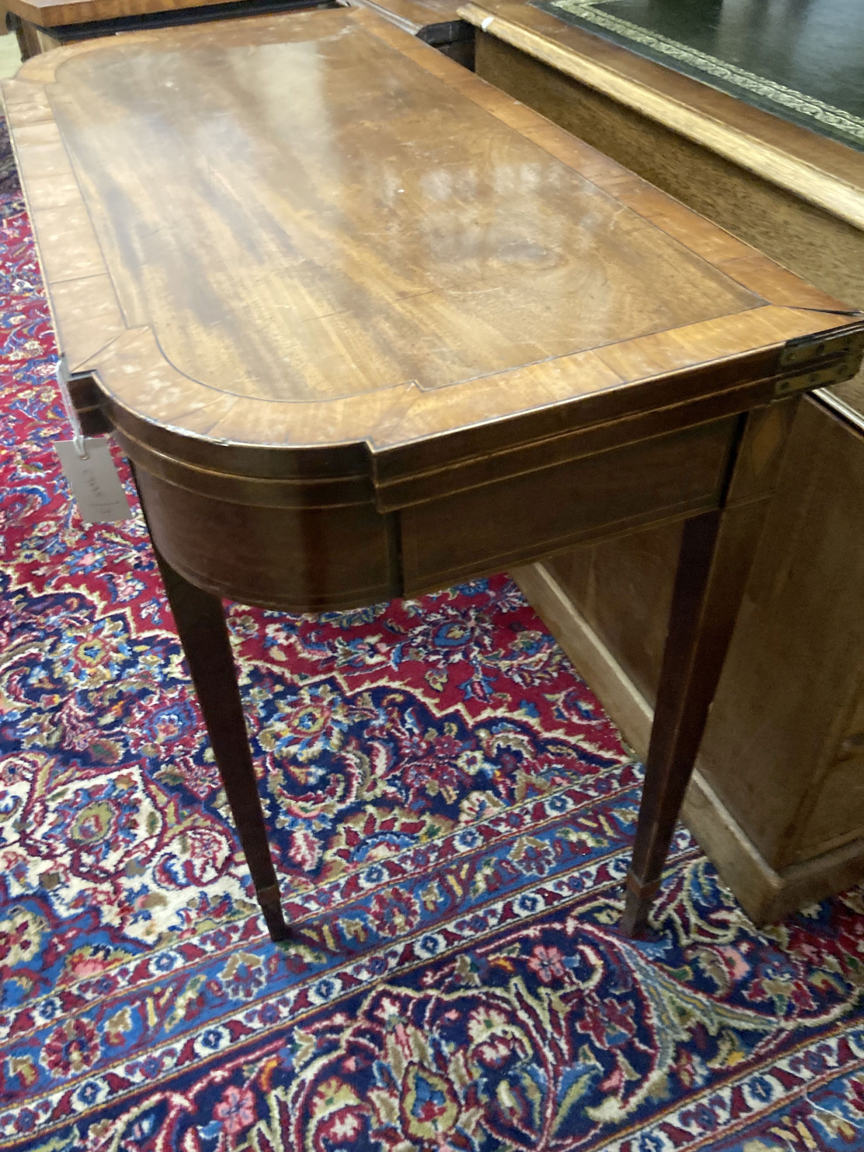 A George IV satinwood banded folding mahogany card table, width 90cm, depth 44cm, height 74cm